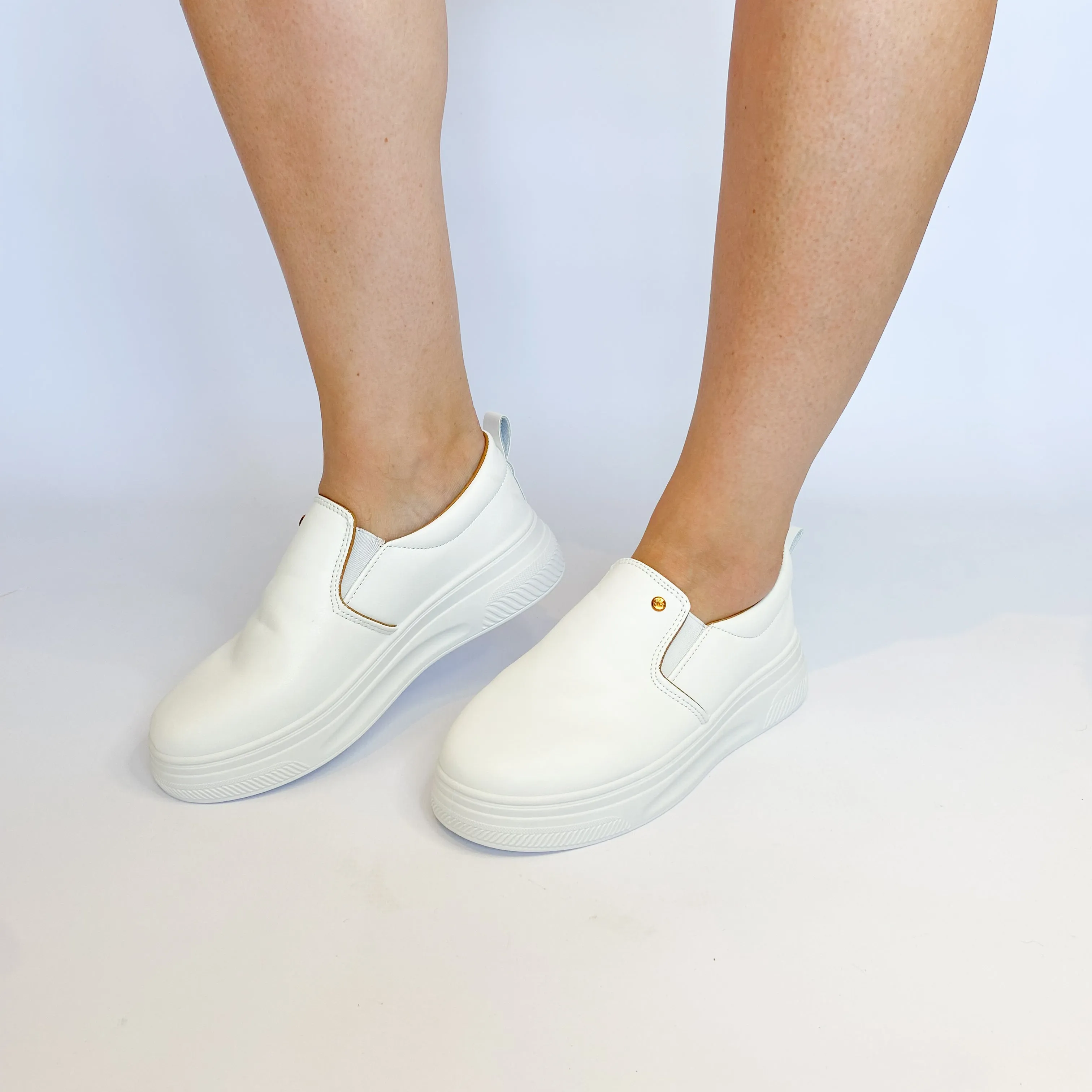 KG white slip on sneaker